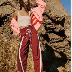 FP Movement by Free People Rust Red Track Joggers with White Stripe
